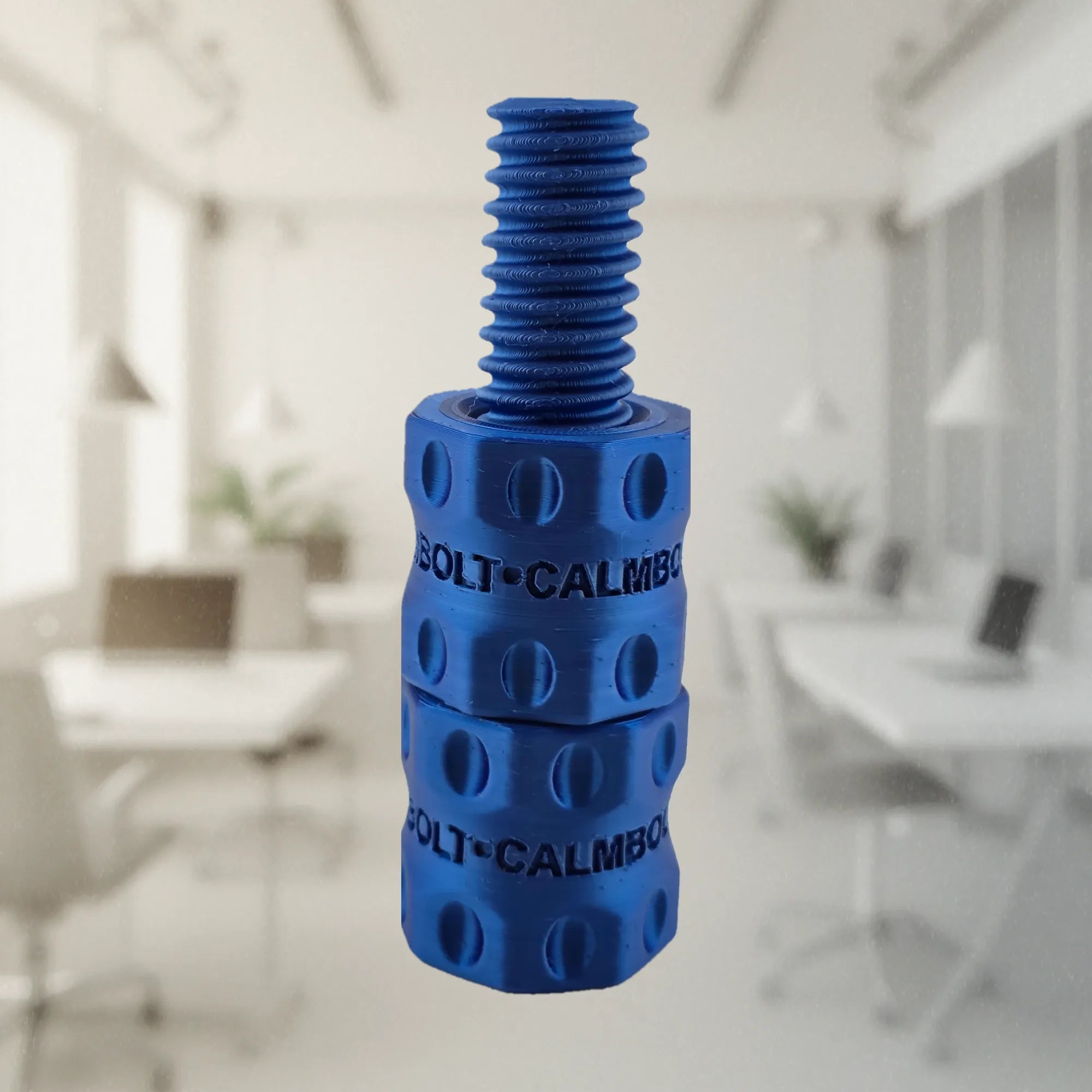 CalmBolt Azure rotating tactile fidget with vivid blue finish and precision layered construction