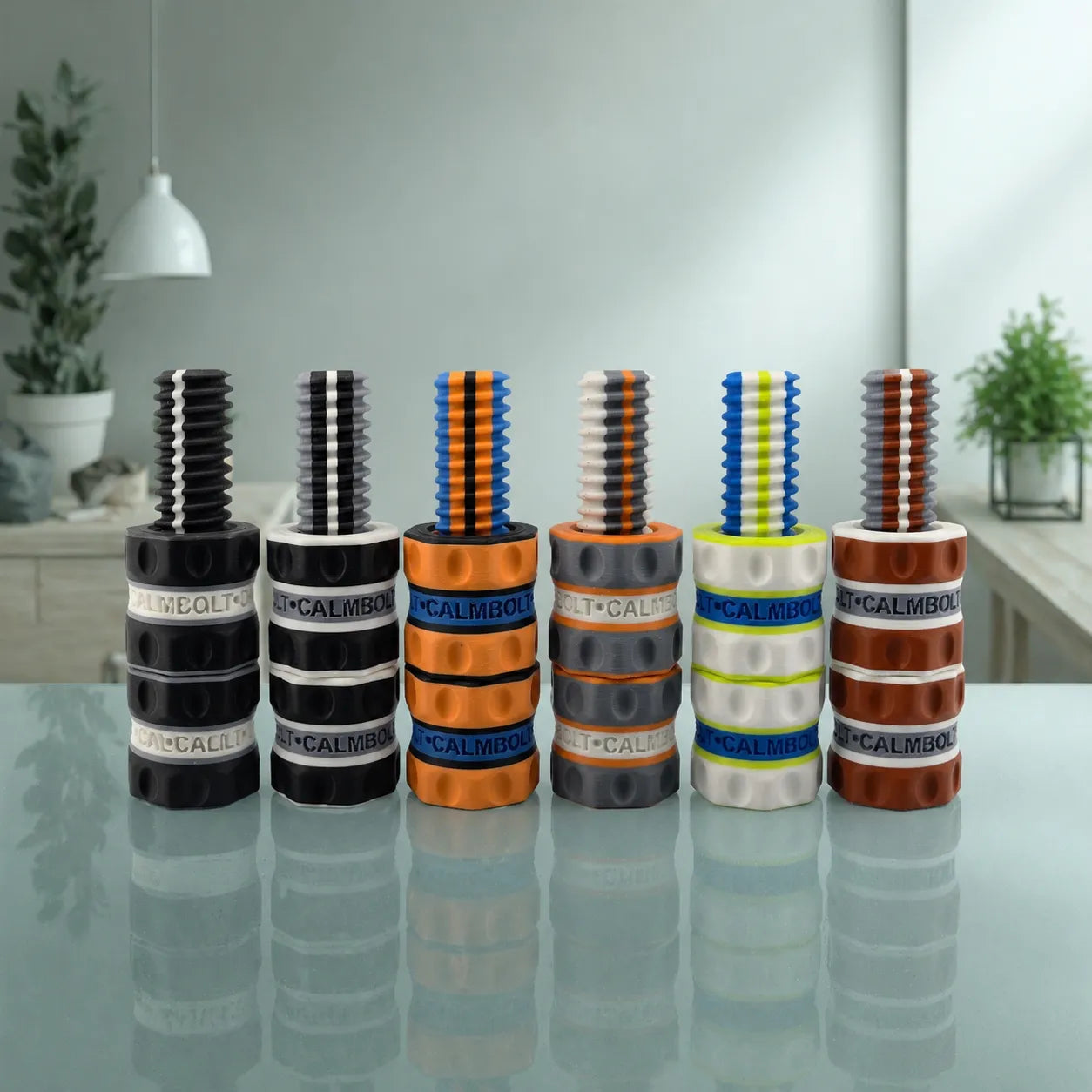 Fusion Series featuring multiple CalmBolt tactile fidgets with bold multi-color combinations and contrasting finishes