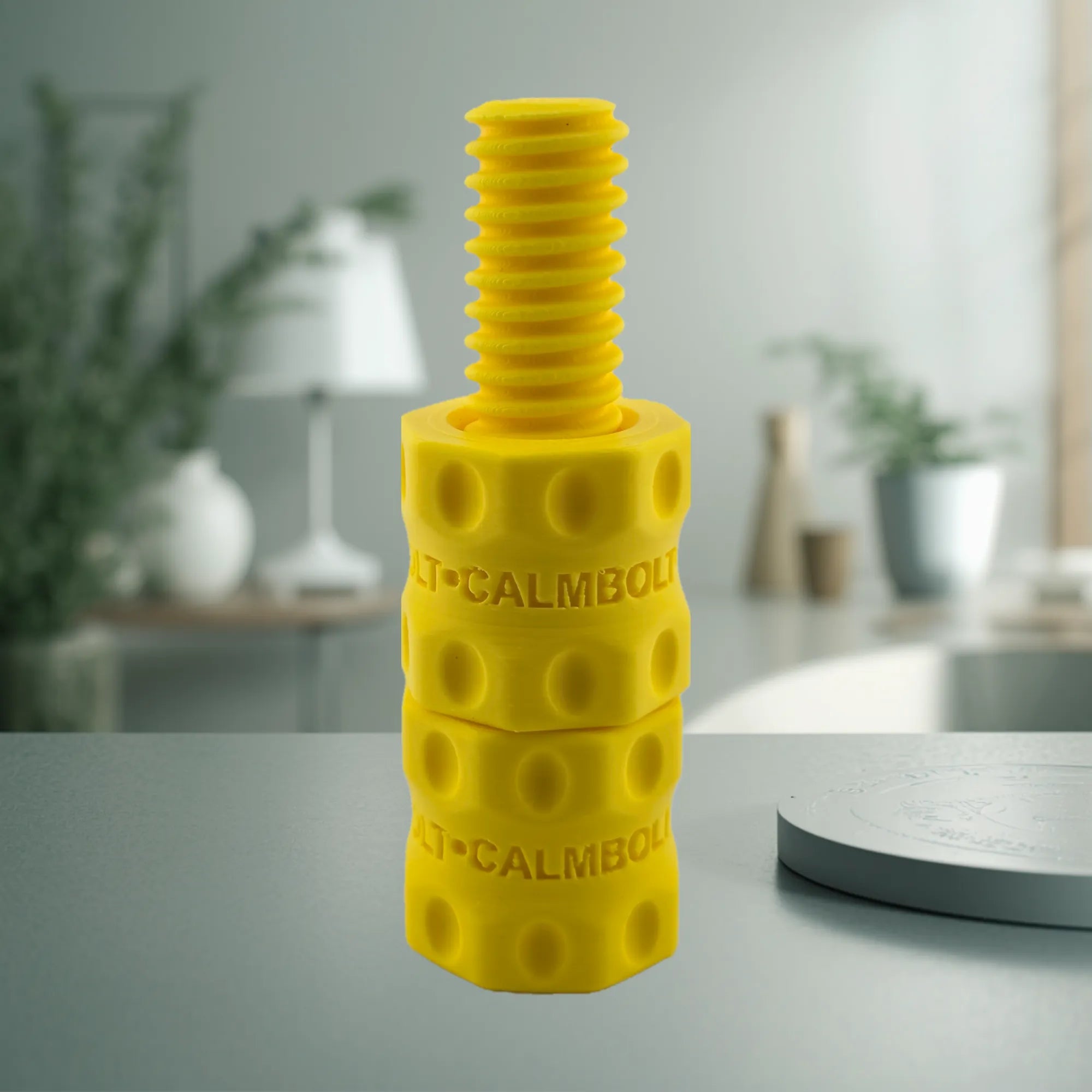 CalmBolt Solar tactile fidget with bright warm tones and smooth rotating silhouette